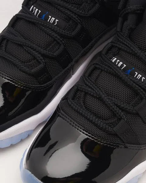 Air Jordan 11 Retro Low Space Jam Black Varsity Royal White Urban Demand Urban Demand